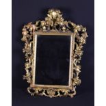 A Fine 19th Century Florentine Carved Giltwood Wall Mirror.
