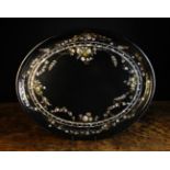 A Large Victorian Oval Papier-mâché Tray decorated with mother-of-pearl inlay enriched with gilding