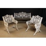 A Victorian Cast Iron Garden Bench & Two Armchairs of Coalbrookdale 'Rustic' design with branch