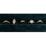 Five Lady's Rings to include four 9 carat gold (two with platinum mounts),