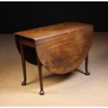 A George III Mahogany Drop Leaf Table.