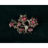 A Pretty Late 18th/Early 19th Century English Brooch fashioned as a spray of flowers set with