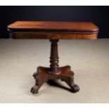 A 19th Century Mahogany Fold-over Tea Table.