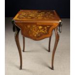 A 19th Century Marquetry Table à Canapé with gilt metal mounts in the Louis XV Style .