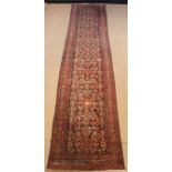 A Long Antique Persian Malaher Carpet Runner.