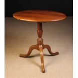 A Late Georgian Cherry-wood Tilt-top Tripod Table.