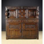 A Large 17th Century Style Oak Court Cupboard.