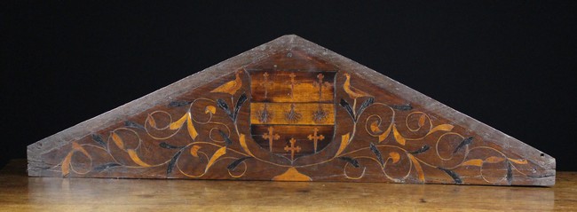 A 17th Century English Oak & Marquetry Apexed Pediment inlaid with central coat of arms flanked by