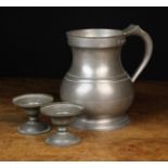 A Half Gallon Pewter Measure by James Yates, and a pair of 18th Century Pewter Salts.