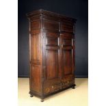 An 18th Century Joined Oak Cupboard.