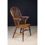 A 19th Century Fruitwood High hoop-backed Windsor Armchair attributed to Buckinghamshire.