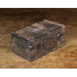 A Small 17th Century Wooden Box with iron strap hinges and bands,