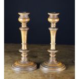 A Pair of Turned Oak Candlesticks, 10½ ins (26.5 cms) in height.