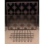 A 17th Century Spanish Wrought Iron Window Grille ornamented with decorative fretted motifs,