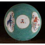 A Derby Dish decorated with Chinoiserie Birds in quatrefoil panels either side of a central roundel