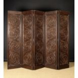 A Large Oak Five Fold Screen carved with Gothic style tracery.