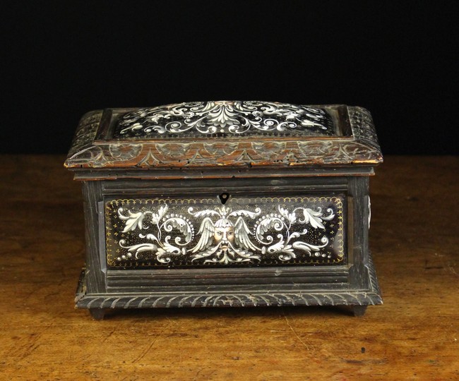 A Small 17th Century Oak Casket inset with Limoges enamelled convex rectangular plaques ornamented