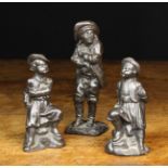 Three 19th Century Cast Iron Ornamental Figures; one 7 in (18 cms) high,