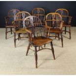 A Harlequin Set of Six Yew-wood Low Hoop-backed Windsor Chairs.