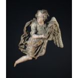 A 17th Century Baroque Carved Wooden Sculpture of Celestial Angel with residual polychrome.