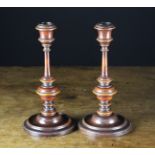 A Pair of Finely Turned 18th Century English Treen Candlesticks, 9 in (23 cm) in height.
