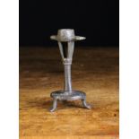 A Small 14th Century French Bronze 'Moustache' Candlestick.