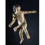 A 17th Century Wood Carving of an Airborne Cherub, 34 in (86 cm) in length.
