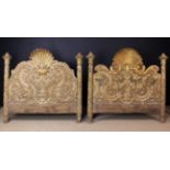 A Near Pair of 18th Century Venetian Carved Giltwood Bed Foot Boards richly decorated with Rococo