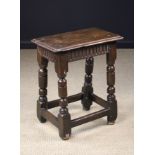 A James I Oak Joint Stool.