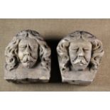 Two Large 19th Century Architectural Ornamental Stone Blocks carved as moustached men's heads with