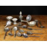 A Collection of Antique Pewter: Twelve spoons, a castor, a wine funnel,