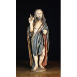 A 16th/Early 17th Century Poychromed Carving of Christ Resurrected,