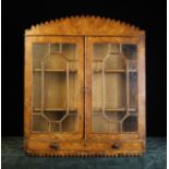 An 18th Century Scottish Pollard Oak Wall Cupboard.