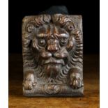 A Late 16th Century/Early 17th Century Carved Oak Lion-mask Corbel Appliqué, 6¾ x 5 in (17 x 13 cm).