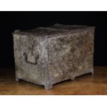 An Unusual 16th Century Iron Strongbox composed of riveted metal sheets with strap hinges and swing