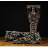 A 19th Century Carved Oak Corbel and Two 18th/19th Century Carved Walnut Spandrels/corner brackets.