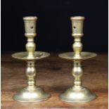 A Pair of 17th Century Style Brass Heemskerk Candlesticks, 7 ins (18 cms) high.