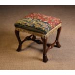 An Early 18th Century Cherrywood Stool.