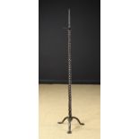 A Tall Painted Wrought Iron Pricket Standish in the 17th century style;