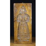 A 19th Century Treen Ginger Bread Mould chip carved with a gentleman on one side and lady on the