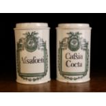 A Pair of 18th Century Rouen Pharmacy Jars labelled 'Afsafoeti' and 'Cafsia Costa' within dark