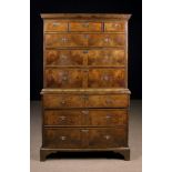 A 18th Century Figured Walnut Veneered Chest on Chest.