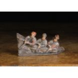 A 16th Century Carved Wooden Miniature Fragment depicting three musicians leant over a gallery