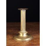 A 17th Century Sheet Brass Candlestick;