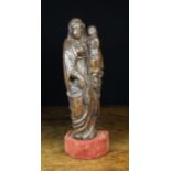 A 16th Century Oak Carving of Virgin and Child, the carving 14 ins (36 cms) in height,