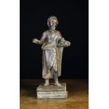An 18th Century Polychromed Carving of St John the Baptist carrying a lamb,