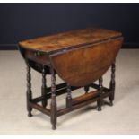 An 18th Century Oak Gateleg Table of modest proportions.