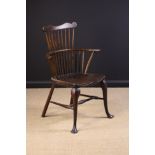A Small 19th Century Comb-back Windsor Armchair standing on cabriole legs united by a turned H-form