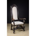 A William & Mary High Backed Arm Chair.