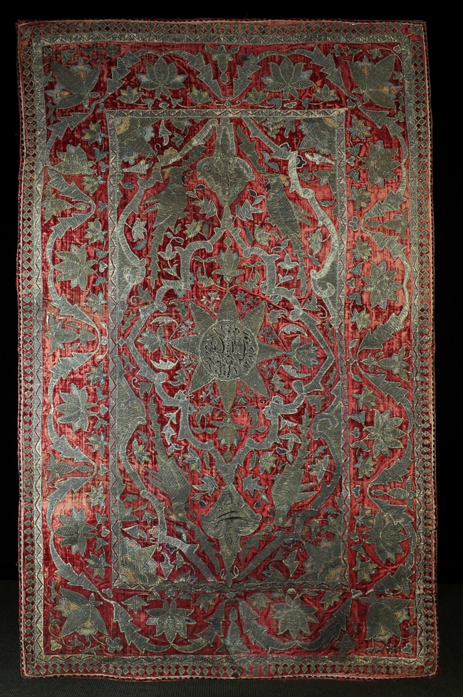 A Fine 16th Century Italian Crimson Velvet Banner embroidered in silver metallic threads with Psedo